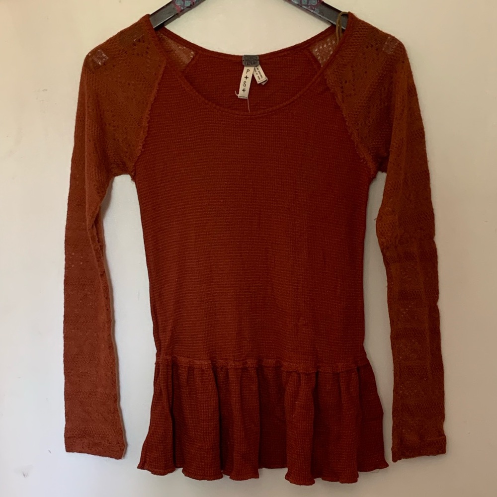 Burnt orange peplum long sleeve blouse